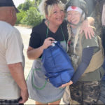 Dr. Alison getting food to the frontline recaptured villages. Lots of love food and hugs.